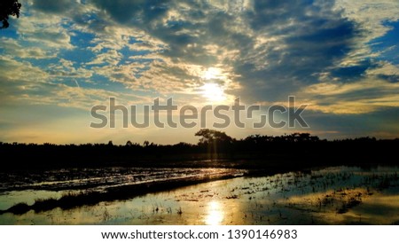 Light of the sun's pictures in the afternoon, and the scenery of the blue sky mix with farmland view, North Sumatra Indonesia, Asia 