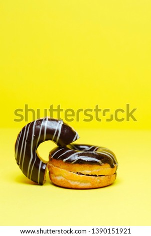 donut eating a donut. abstract image of a bitten pastry.Sweet dessert