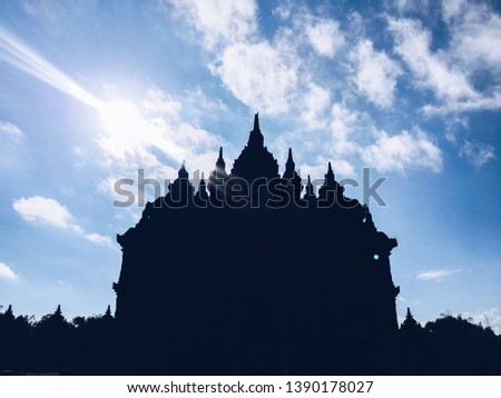 Silhouette view of Plaosan Temple in Plaosan Complex temple with blue sky and sunny sun background. One of the javanese Buddhist temples located in Prambanan, Klaten, Central Java, Indonesia.