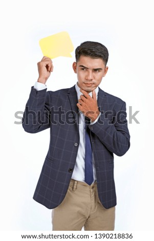 Asian handsome young business man holding concept bubble speech, isolated on white background, with copy space