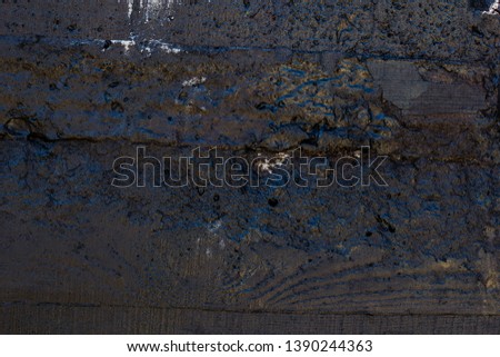 The texture of the old wall in black with texture