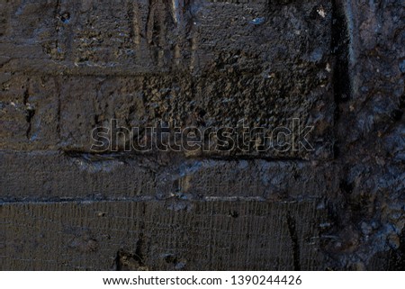 The texture of the old wall in black with texture