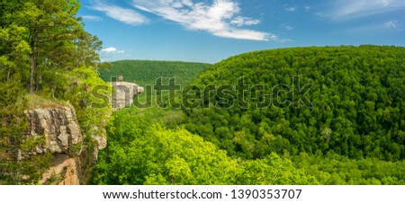 Tourist visitors taking a selfie picture at Whitaker Point rock cliff hiking trail, landscape view, Ozark mountains, nwa northwest arkansas Royalty-Free Stock Photo #1390353707