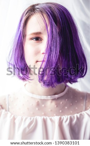 Teen girl with purple hair. Hipster.