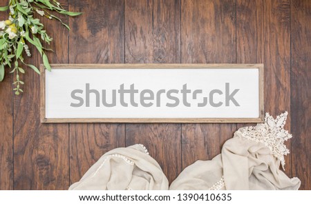 Blank rectangular horizontal wood sign on dark wood background with props, mock up