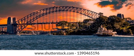 Sunset over the iconic coat hanger bridge in Sydney