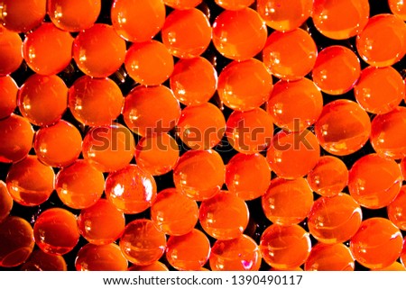 Bright orange balls. Group of round objects. Abstract background for your design. Geometric wallpaper