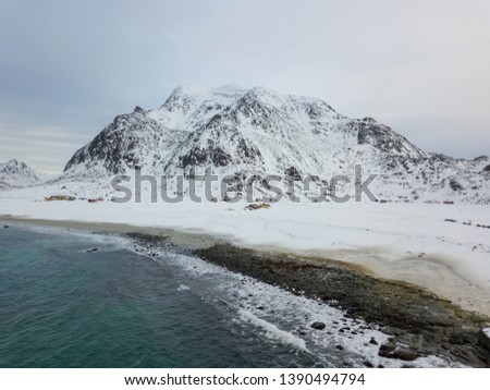 Aerial drone panoramic view of amazing Lofoten Islands. Top view picture at sunset. Winter scenery with famous nordic landscape in Norway, Scandinavia. 
