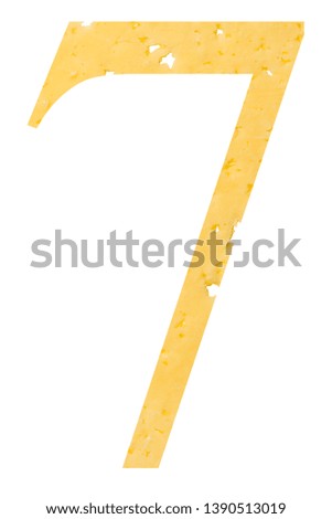 The figure "7" of cheese with holes on a white isolated background, a symbol of proper nutrition and education. Vertical frame