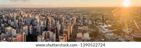 curitiba city in the late afternoon of a beautiful sunday sun, with few clouds in the sky, photographed by drone, forming this beautiful and magnificent view of downtown in brazil.
 Royalty-Free Stock Photo #1390522724