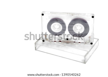 magnetic tape cassette standing on a case isolated on a white background, copy space.