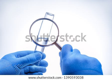  checking water quality at water in laboratory. Water quality check concept. Royalty-Free Stock Photo #1390593038