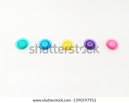 colorful collection of magnets. isolated on white background