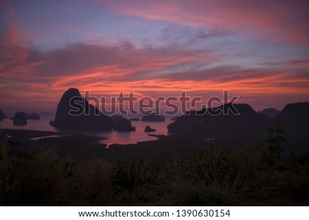 Morning light with mountains near the sea, Samed Nang Chee viewpoint tropical zone in Phang Nga Thailand.