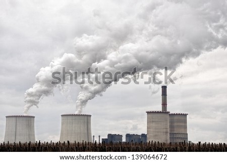 Modern power plant exhausting large amount of vapor outdoors