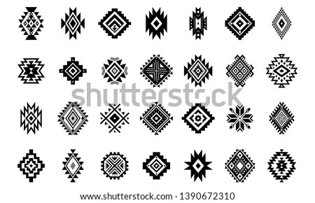 Aztec vector elements. Set of ethnic ornaments. Tribal design, geometric symbols for tattoo, logo, cards, decorative works. Navajo motifs, isolated on white background. Royalty-Free Stock Photo #1390672310