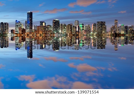 Miami Skyline seen from Key Biscayne at dusk with beautiful reflections