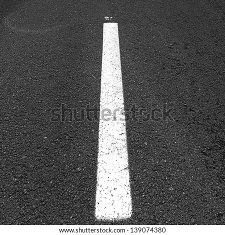 Road with a white stripe texture or background