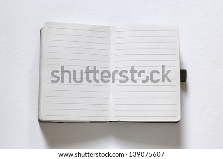 opened notebook or diary on white background