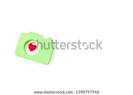 photo camera concept with heart on white background top view mock up
