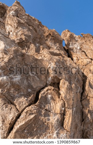 Salty rocks in the plain of salt in the Danakil Depression in Ethiopia in Africa.