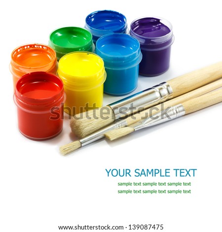 Colorful paints and artist brushes Royalty-Free Stock Photo #139087475