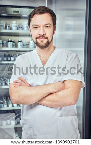 Portrait of a doctor in the interior of the clinic