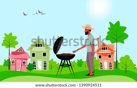 a man roasts meat outdoors. picnic in the countryside. barbecue grill
