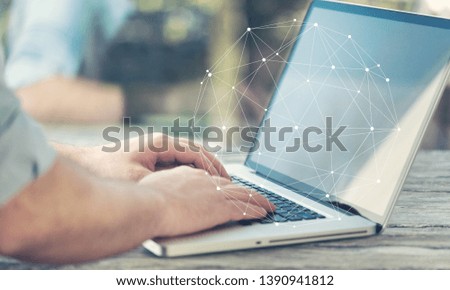 Woman hand using laptop device at co-working office, Social network concept.
    
    - Image
