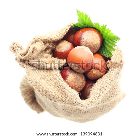 Hazelnuts in sack isolated