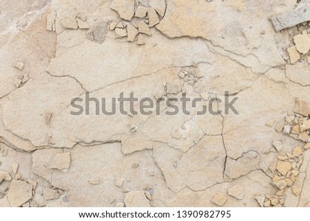 Crushed rock background. Cracked structure, abstract motif. 