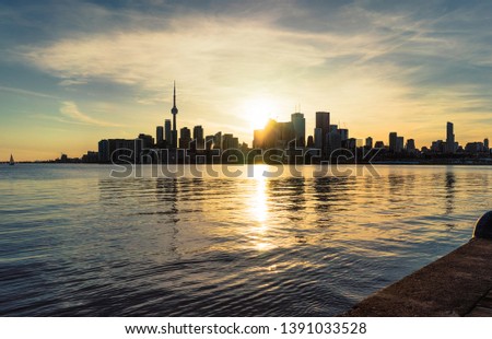 Toronto's waterfront skyline at sunset