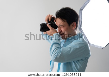 Photographer taking a picture image