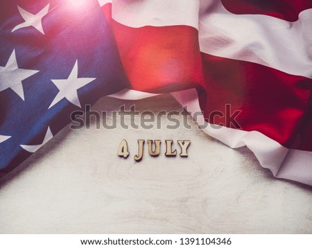 Beautiful greeting card for Independence Day. Close-up, top view, isolated background. Concept of preparing for the holiday. Congratulations for loved ones, relatives, friends and colleagues