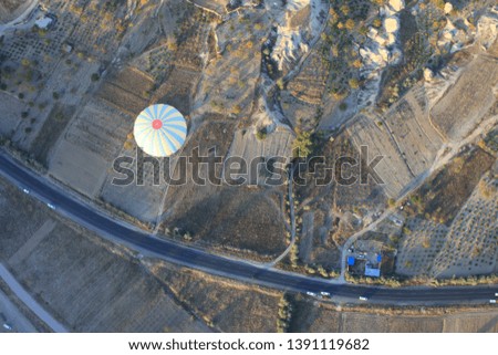 Cappadocia's white hot air balloon from bird's-eye