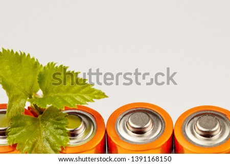 Green energy, renewable, electrical energy, concept on a white background with copy space. Bright colors, high contrast, closeup.