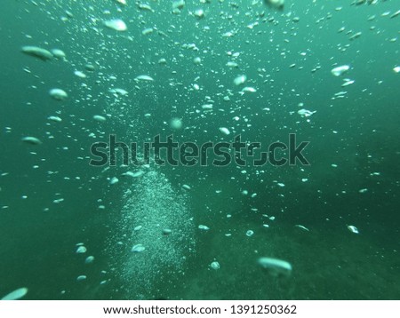 Bubble under the sea from oxygen tank.