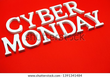 Cyber Monday Sale alphabet letters on red background business concept