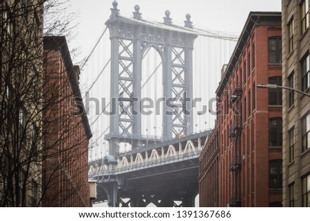 The famous view of the Manhattan bridge at Dumbo in the streets of Brooklyn, New York