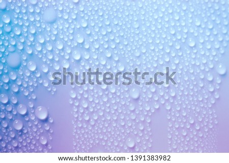 Water Drops. Bubbles close-up. The texture of gel cream. Oxygen bubbles in clear blue water, close-up. Mineral water. Water enriched with oxygen.