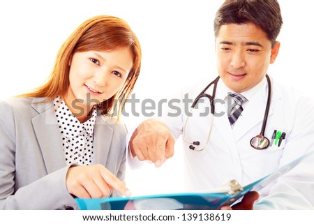 Happy medical doctor and patient