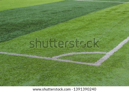 football stadium field cut green grass striped surface with white lines marking of corned place, sport game playground picture, copy space
