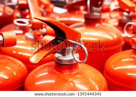 Lots of fire extinguishers close up