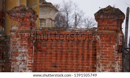 Antique brickwork of red brick walls with arches