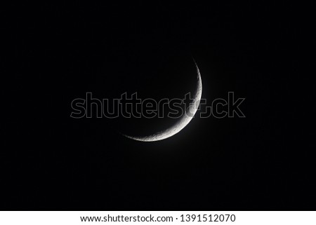 Crescent moon image in the night.