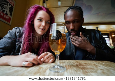 Couple intensely attracted to beer