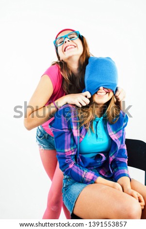two best friends teenage girls together having fun, posing emotional on white background, besties happy smiling, making selfie, lifestyle people concept