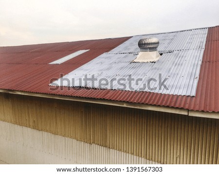 Ventilation ducts, wind energy, working on the old factory roof
