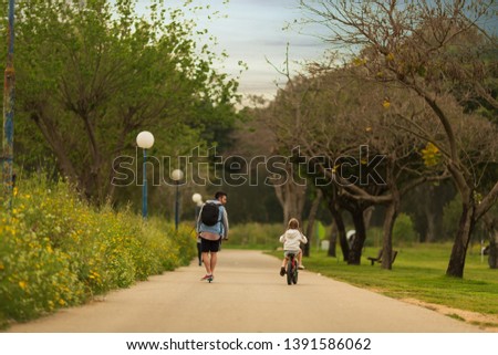 Father and daughter spend time together in the park