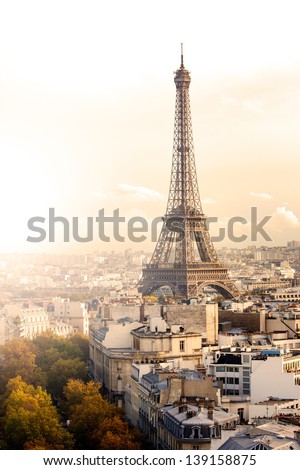 Aerial view of Paris and Eiffel Tower at sunset with copy space.